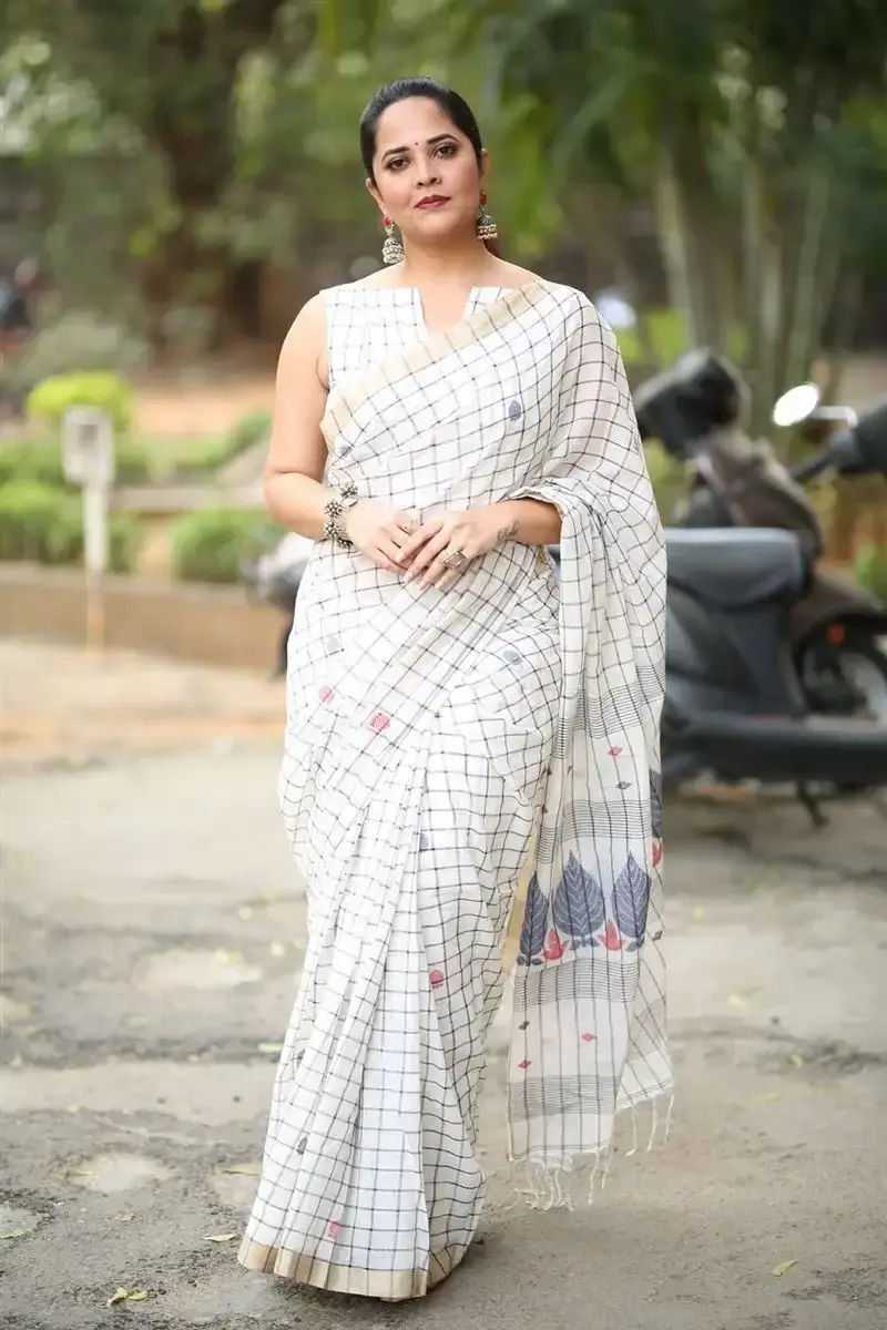 Anasuya Bharadwaj in White Saree at Razakar Movie Launch